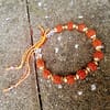 Pulseira Rudaksha Dourada Regulavel