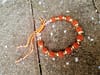 Pulseira Rudraksha Dourada Regulavel