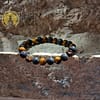 Pulseira Olho de Tigre e Pedra Lava 8mm